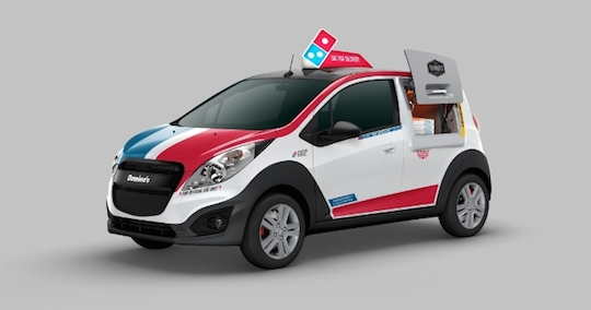 Domino’s launches automotive campaign as its fleet spreads across America