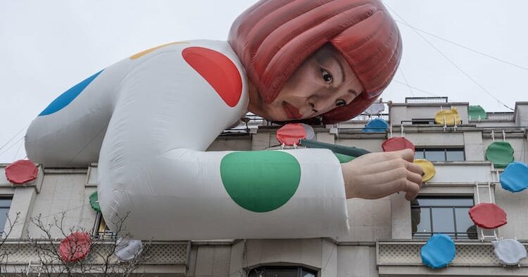 Yayoi Kusama's giant sculpture looks over Louis Vuitton's Paris store