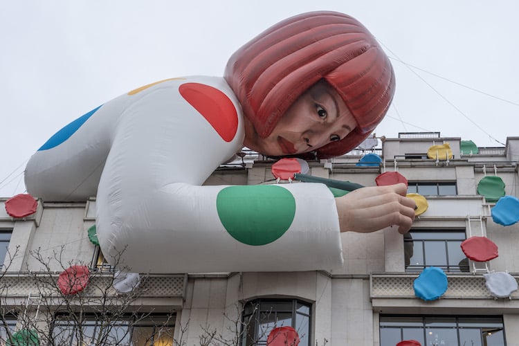 Yayoi Kusama Sculpture Peers Over Champs Elysées Louis Vuitton